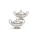 A pair of George III silver navette shape sauce tureens and covers by John Schofield