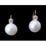 A pair of diamond and South Sea cultured pearl earrings