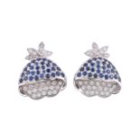 A pair of sapphire and diamond floral earrings