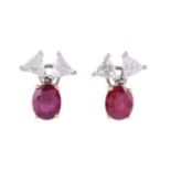 A pair of diamond and ruby earrings