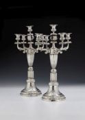 A pair of Spanish silver five light candelabra by José Ramírez de Arellano