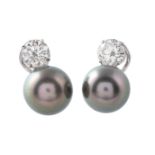 A pair of Tahitian cultured pearl and diamond earrings