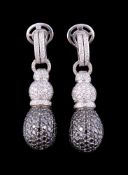 A pair of diamond and black diamond ear pendants