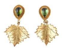 A pair of peridot leaf earrings by Natalia Josca