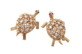 Two 1960s diamond turtle brooches by Cartier