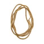 A handmade gold coloured foxtail link necklace by Natalia Josca the chain composed of woven gold col