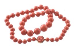 ϒ A coral bead necklace