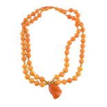 A pressed amber bead necklace