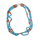 A turquoise and red bead necklace by Natalia Josca