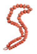 ϒ A single strand coral bead necklace