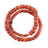 ϒ A single strand coral bead necklace