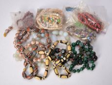 A group of bead necklaces