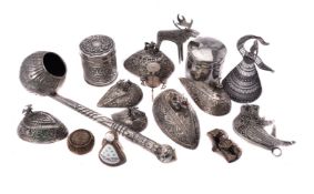 A collection of silver coloured and mounted items