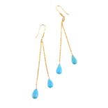 A pair of turquoise earrings
