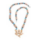 An Ethnic shell disc necklace