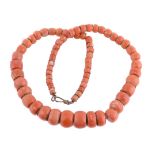 ϒ A single strand coral bead necklace