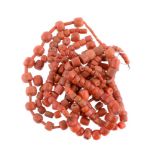 ϒ A group of coral beads