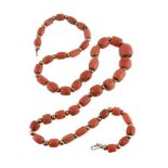 ϒ A single strand coral bead necklace