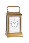 A French gilt brass carriage clock