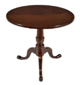 A mahogany tripod table