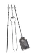 A set of steel and nickel plated fire tools