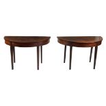 A pair of George III mahogany and string inlaid side tables