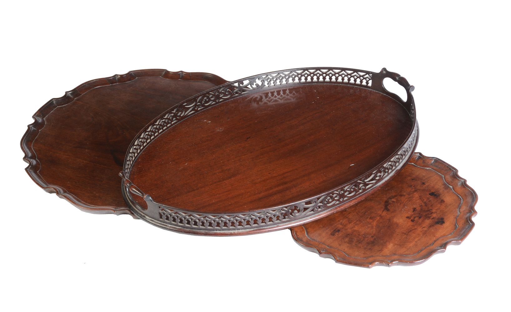 A group of three various mahogany trays