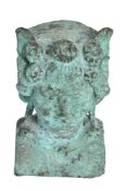 A verdigris patinated bronze herm top cast as the bust of a youthful Bacchus