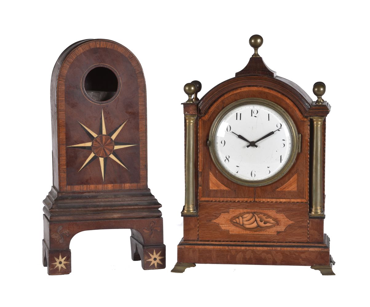 ϒ A patridgewood, satinwood, and inlaid mantel timepiece