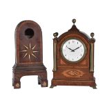 ϒ A patridgewood, satinwood, and inlaid mantel timepiece