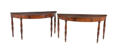 A pair of mahogany side tables