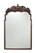 A Continental exotic hardwood wall mirror