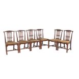A set of six mahogany dining chairs in George III Gothic style