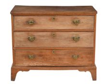 A George III elm chest of drawers