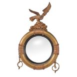 A George IV giltwood and composition convex wall mirror