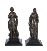 A pair of Continental, probably French gilt bronze mounts cast as maidens,