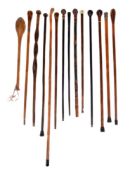 ϒ A collection of twelve various walking sticks