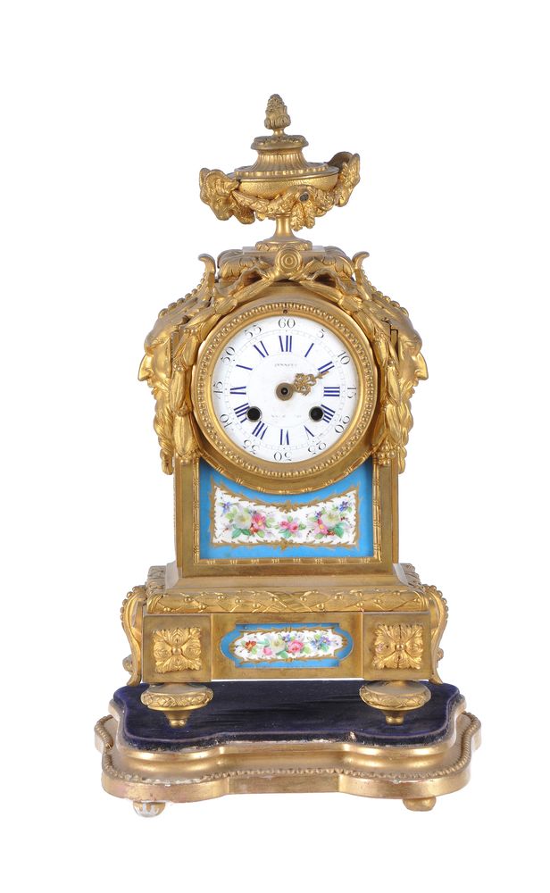 A French ormolu and Sevres style porcelain inset mantel clock