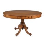 A Victorian oak oval library table