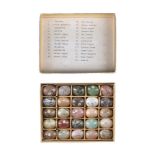 A collection of twenty five semi-precious stone specimen models of eggs