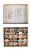 A collection of twenty five semi-precious stone specimen models of eggs