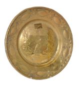 A Nuremberg brass alms dish, late 15th century