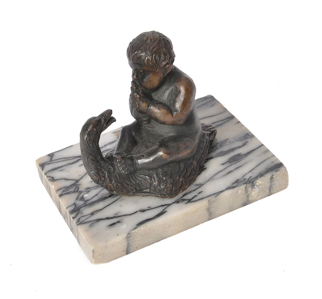 An Italian, probably Venetian or Paduan, patinated bronze group of a putto on a swan