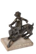 A Continental patinated bronze group of a putto on a donkey