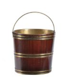 A George III mahogany and brass bound bucket