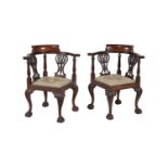 A pair of mahogany corner chairs