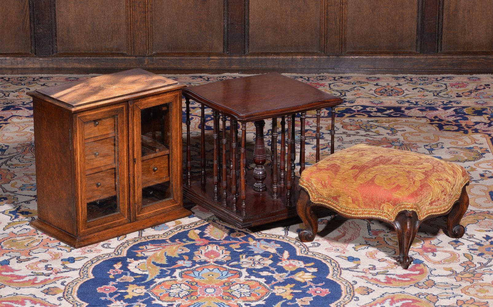 A mahogany table top revolving bookcase