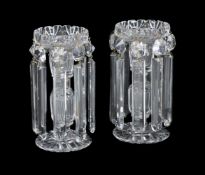 A pair of Victorian cut glass lustre candlesticks