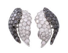 A pair of diamond and black diamond earrings