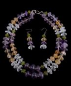 A two row amethyst, rock crystal, citrine and peridot bead necklace